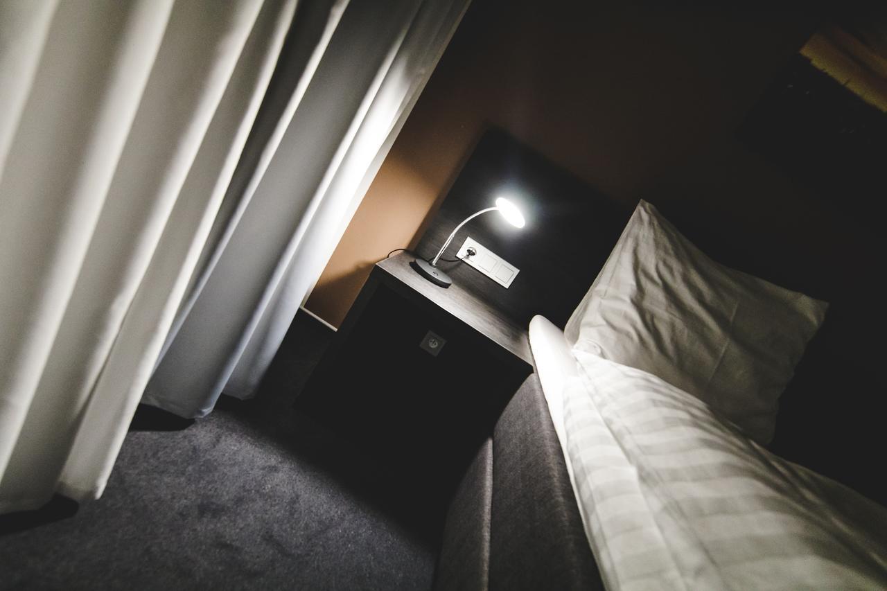Silesia Residence 俄斯特拉发 外观 照片 A bedside table